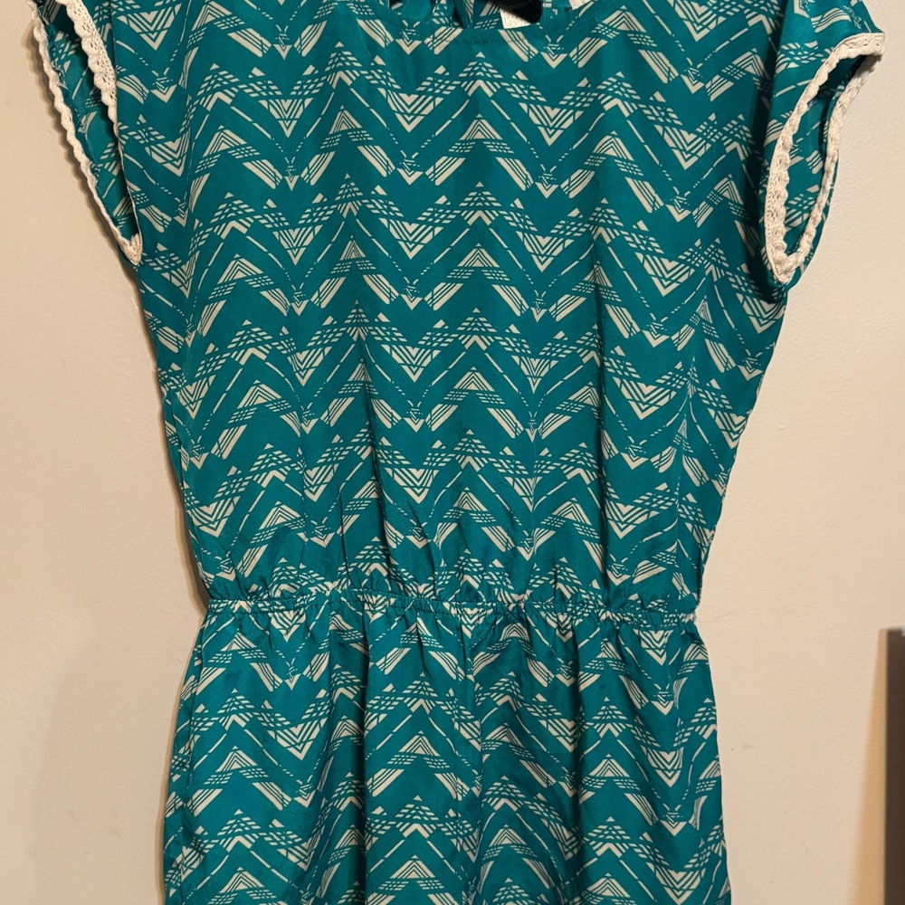 Teal Patterned Romper with Cream colored Accents